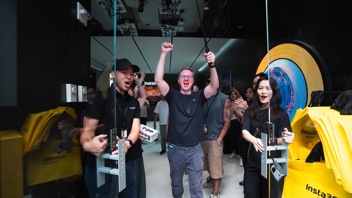 Customers trying Insta360 cameras inside the company's first US flagship store in Times Square
