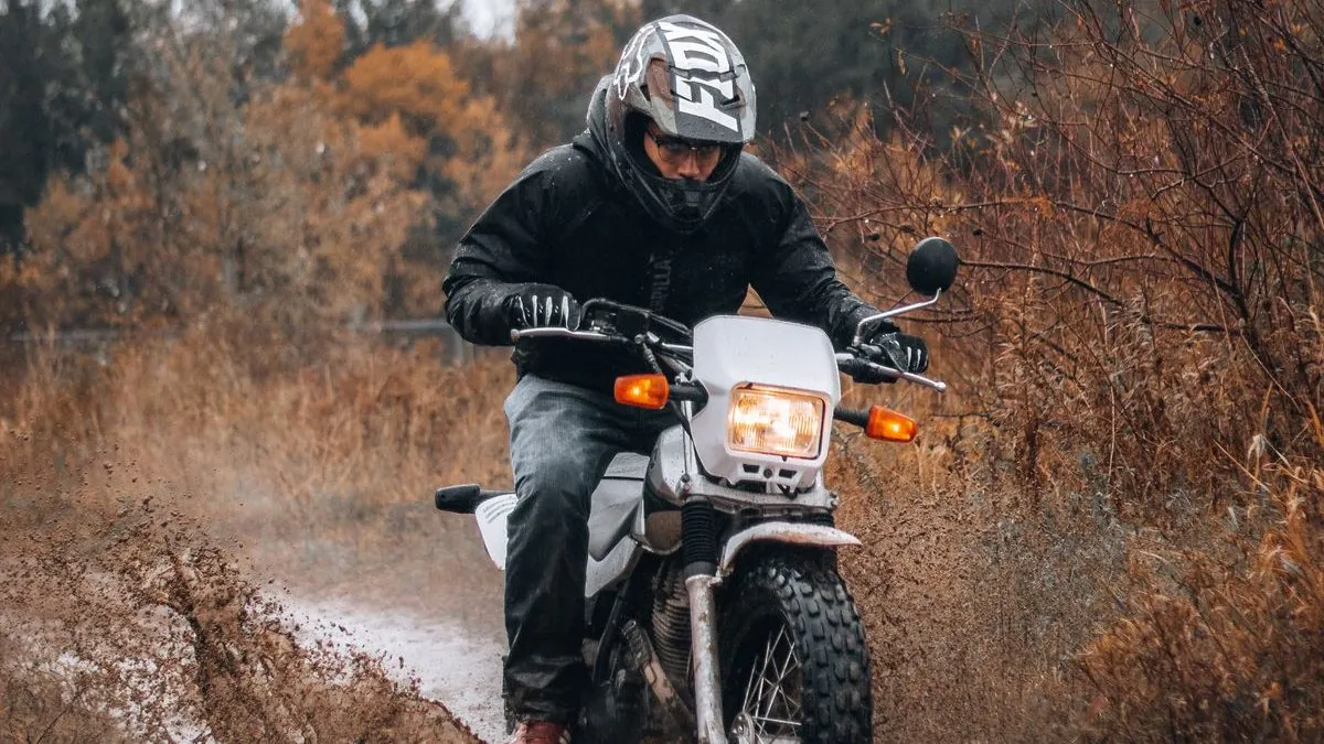 Off-road motorcycle riding through terrain