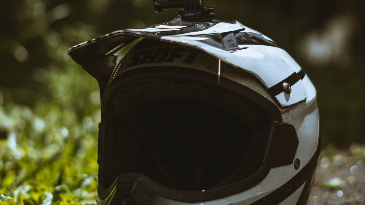 Close-up of motorcycle helmet with action camera