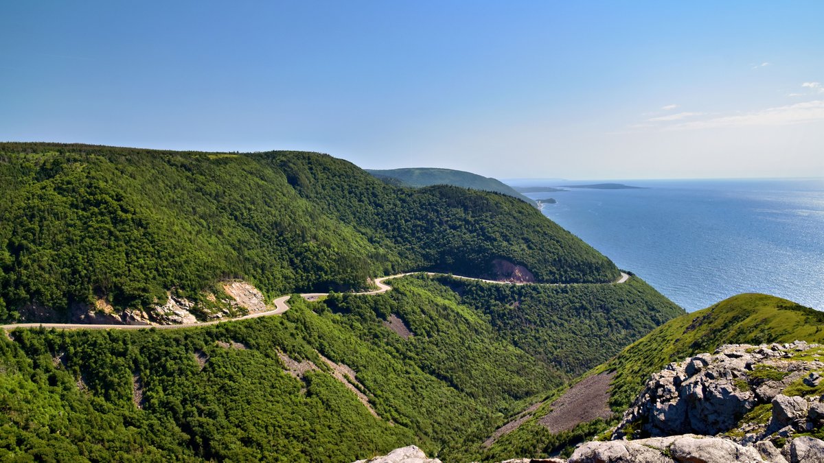 Scenic coastal view of the Cabot Trail winding through the Cape Breton Highlands, Nova Scotia
