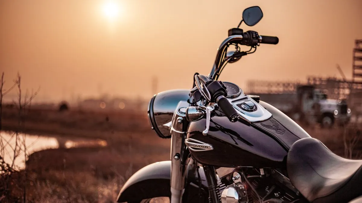Row of new motorcycles at a dealership representing the 2026 motorcycle market with rising prices and sales