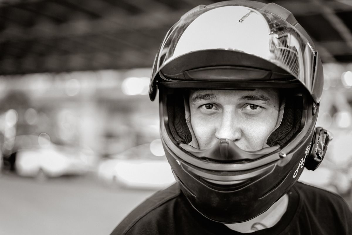 Close-up of a motorcyclist wearing a helmet