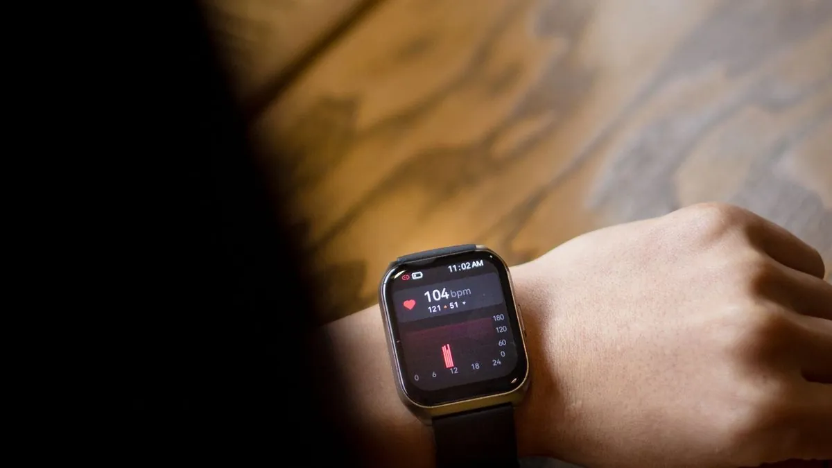 Smartwatch showing health metrics outdoors