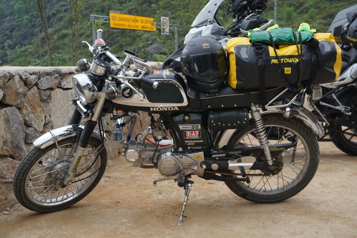 Indian Pursuit loaded with touring gear by a New Brunswick lake