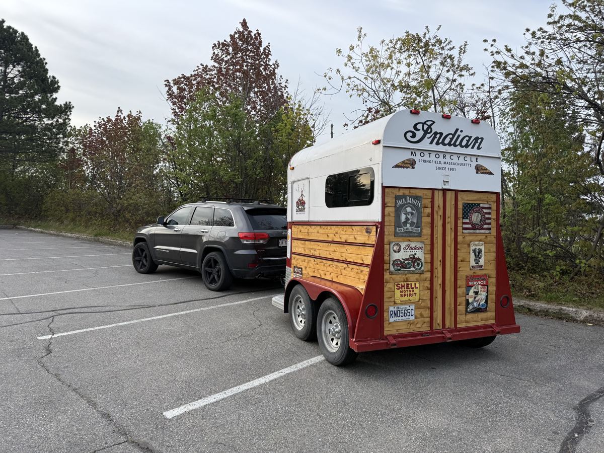 Rear of the custom Indian Motorcycle trailer — vintage decals, wood panelling, and Indian branding