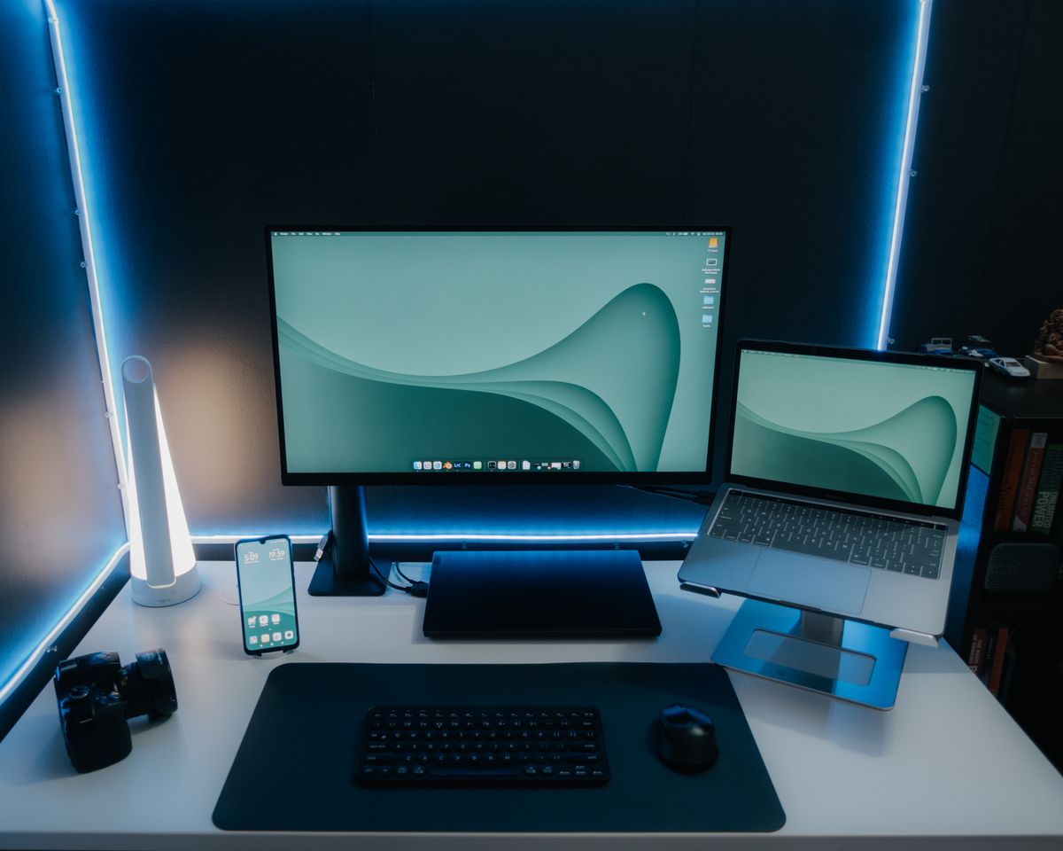 Portable monitor setup on desk for remote work