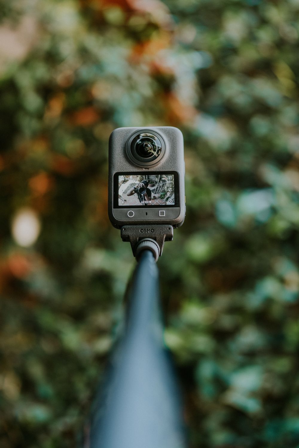 Action camera mounted on helmet for POV footage