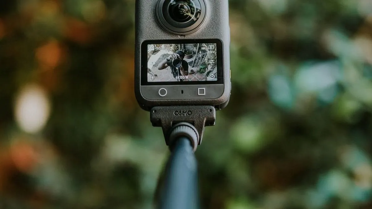 Action camera mounted on helmet for POV footage