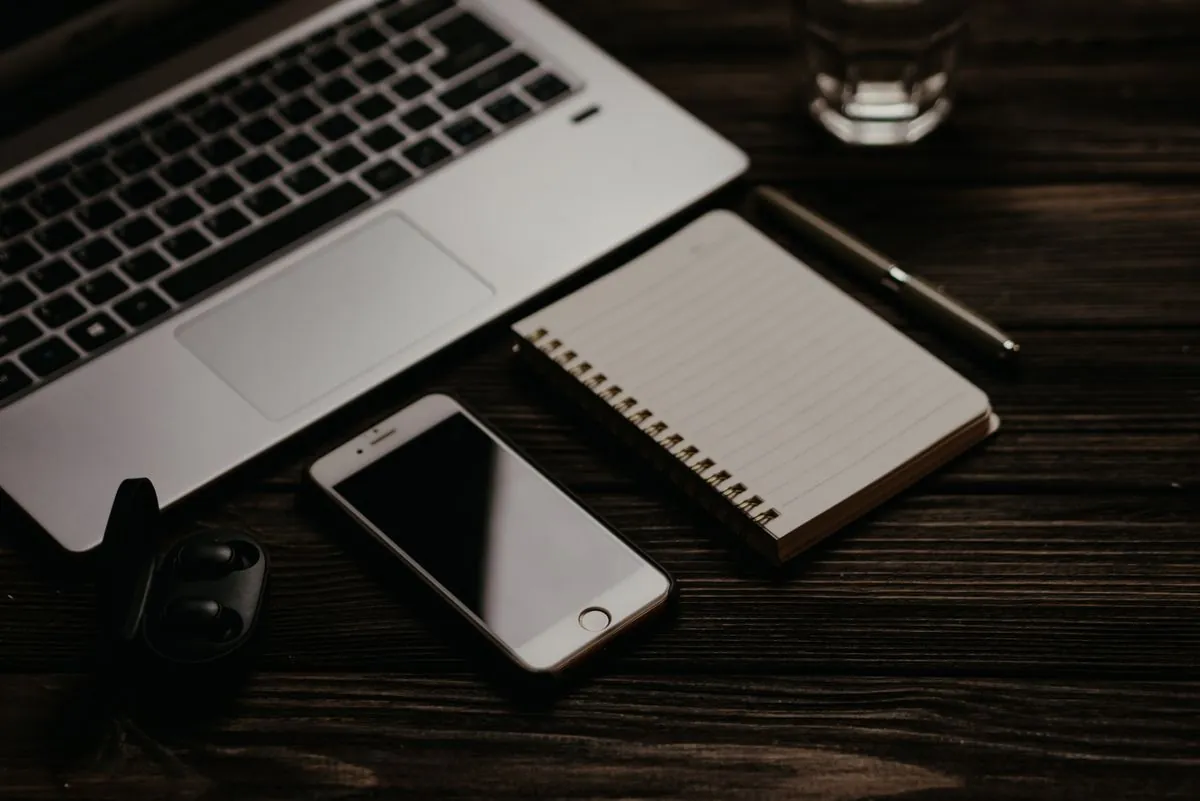 Modern tech setup with laptop, phone and earphones — Father's Day tech gift guide 2026