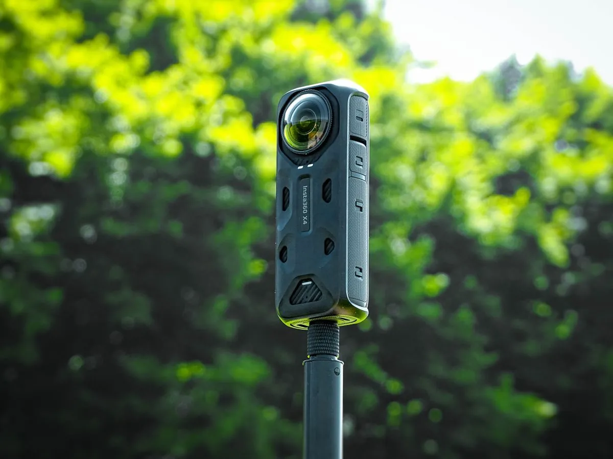 Action camera mounted on tripod outdoors