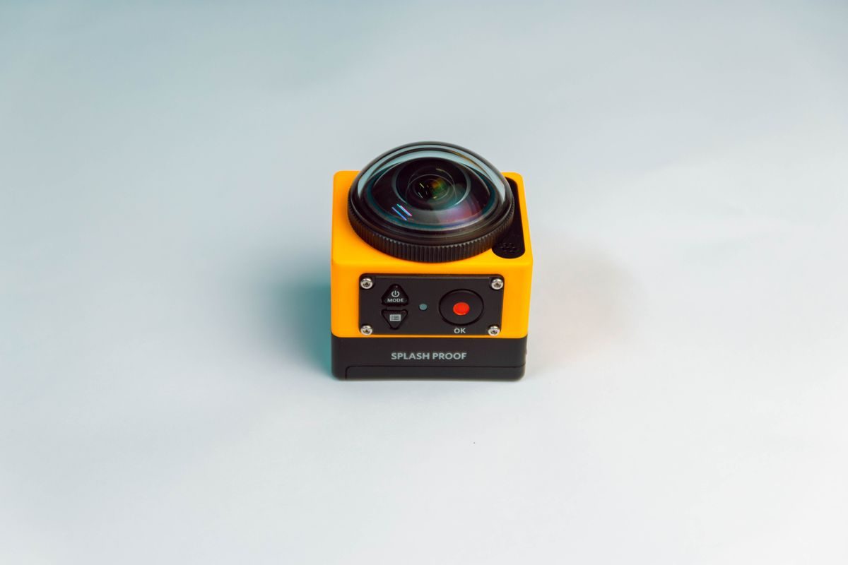 Compact action camera with splash-proof features