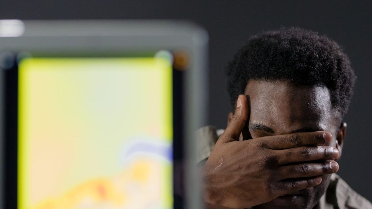 Person using a thermal imaging camera