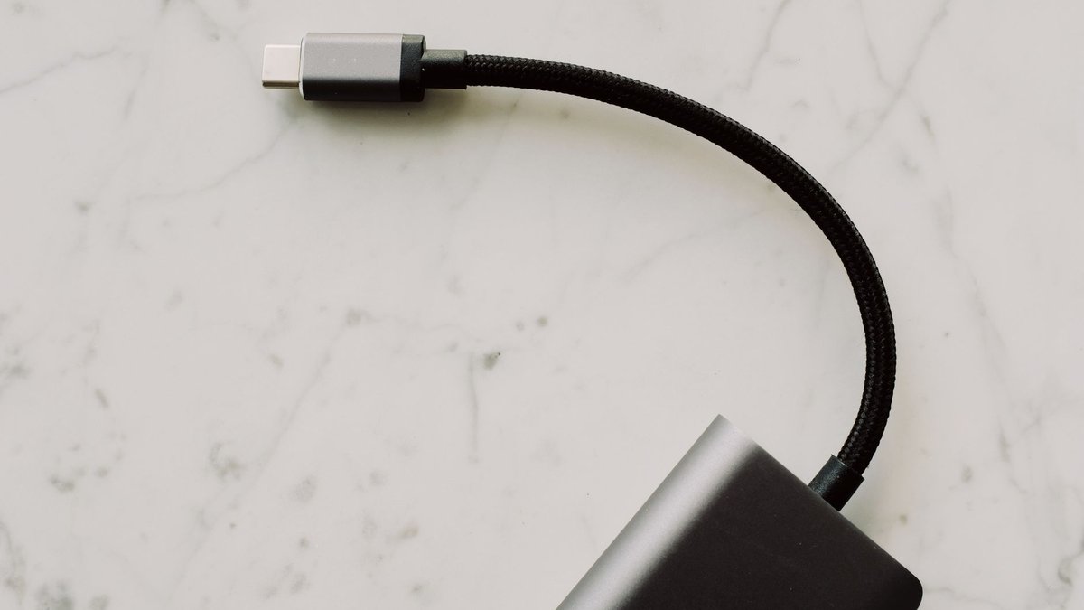 USB-C charging setup for a laptop and travel devices